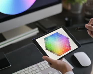 tablet with bright picture in hands